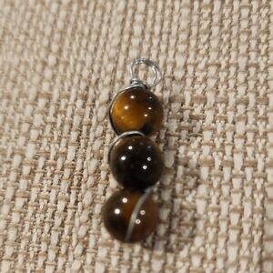 Elegant Silver and Brown Beaded Pendant
